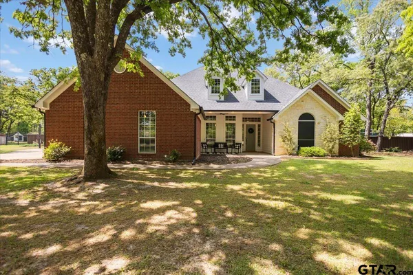 a view of front door of house and patio