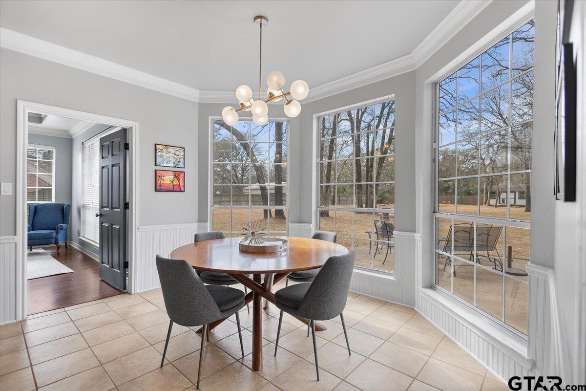 17679 Briarpatch Lindale, TX 75771 - Photo 16 of 47 a view of a dining room with furniture wooden floor and chandelier