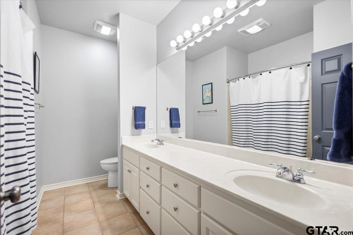 17679 Briarpatch Lindale, TX 75771 - Photo 32 of 47 a spacious bathroom with a double vanity sink mirror and double