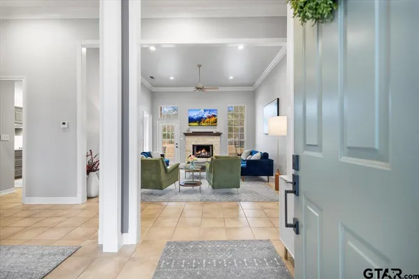 a spacious bedroom with a bed and a couch