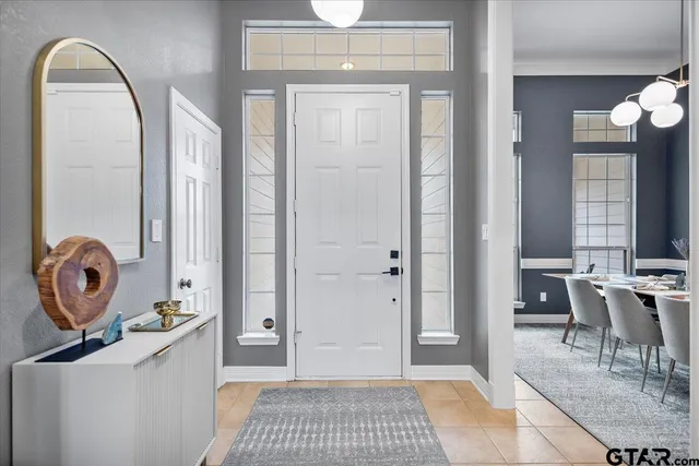 a view of a livingroom with furniture and window