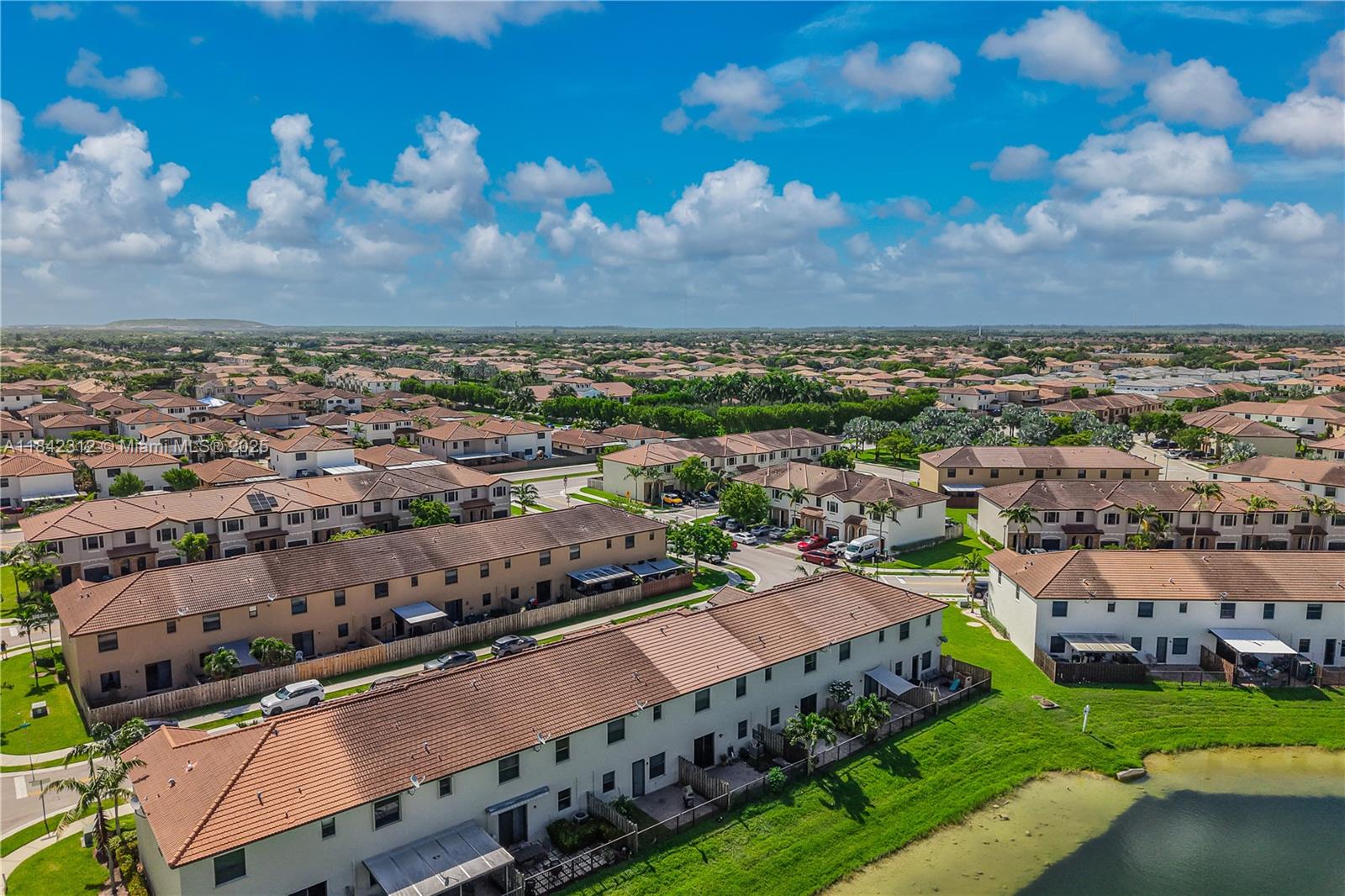 23634 Southwest 117 Place Homestead, FL 33032 - Photo 26 of 31 an aerial view of a city