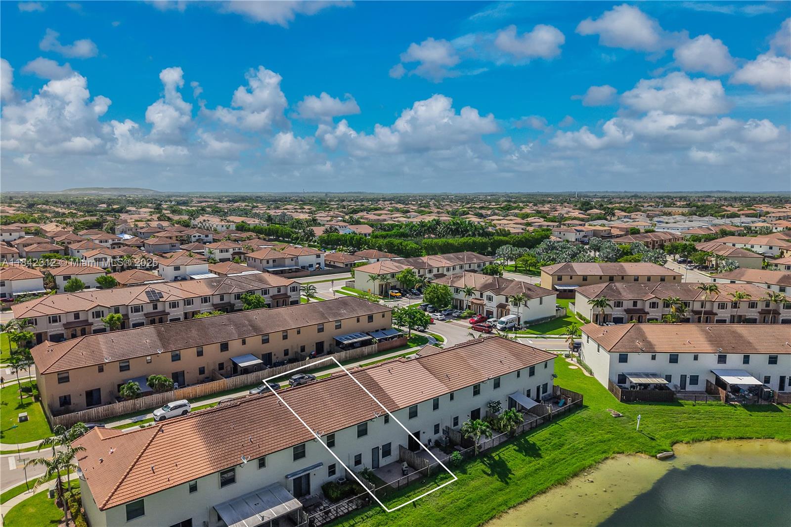 23634 Southwest 117 Place Homestead, FL 33032 - Photo 27 of 31 an aerial view of a city