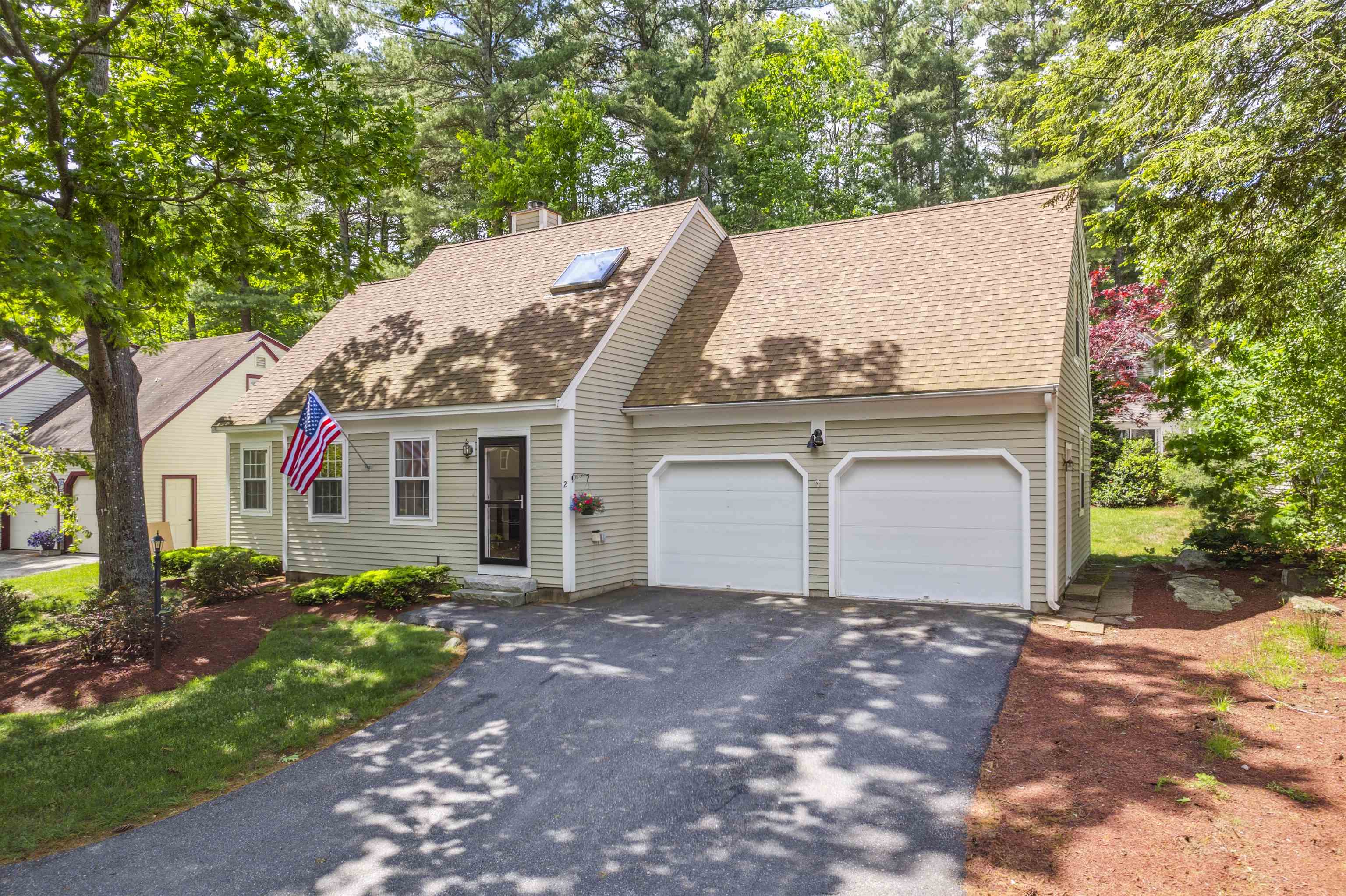 2761 Lake Shore Road, Unit 2 Gilford, NH 03249 - Photo 1 of 40