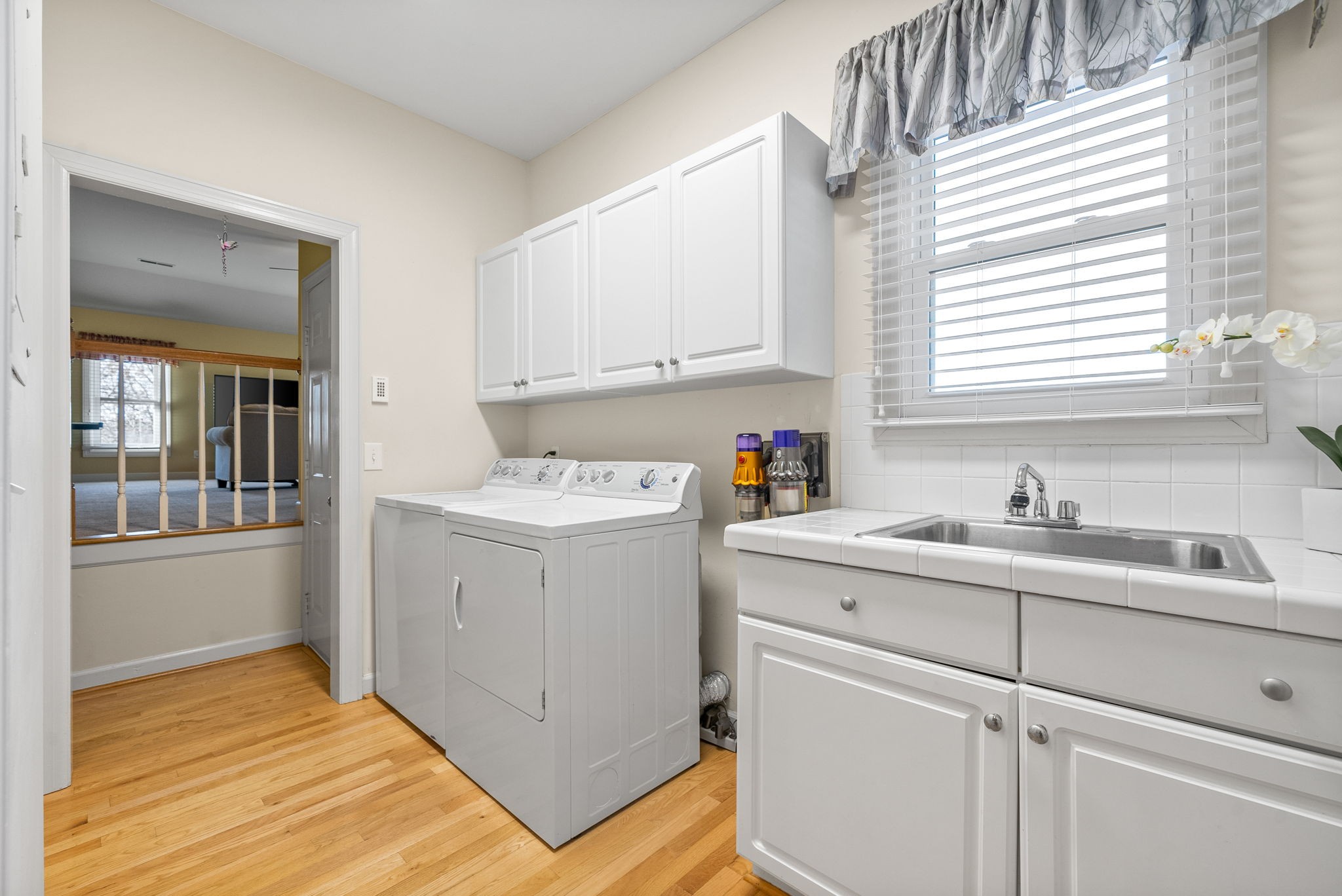 1904 Springcroft Drive Franklin, TN 37067 - Photo 12 of 30 a view of cabinets a sink and dishwasher in a kitchen