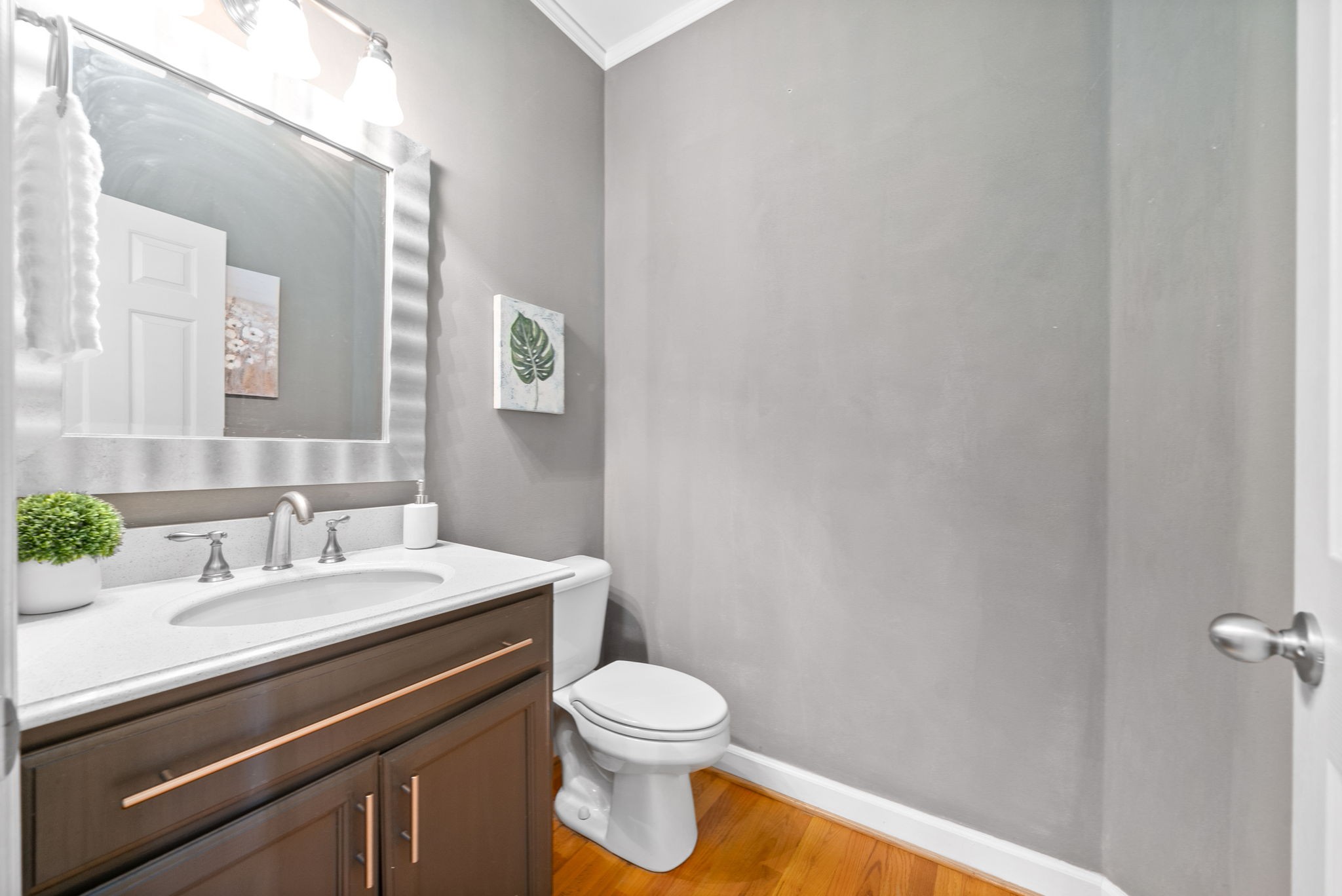 1904 Springcroft Drive Franklin, TN 37067 - Photo 14 of 30 a bathroom with a sink a toilet and mirror