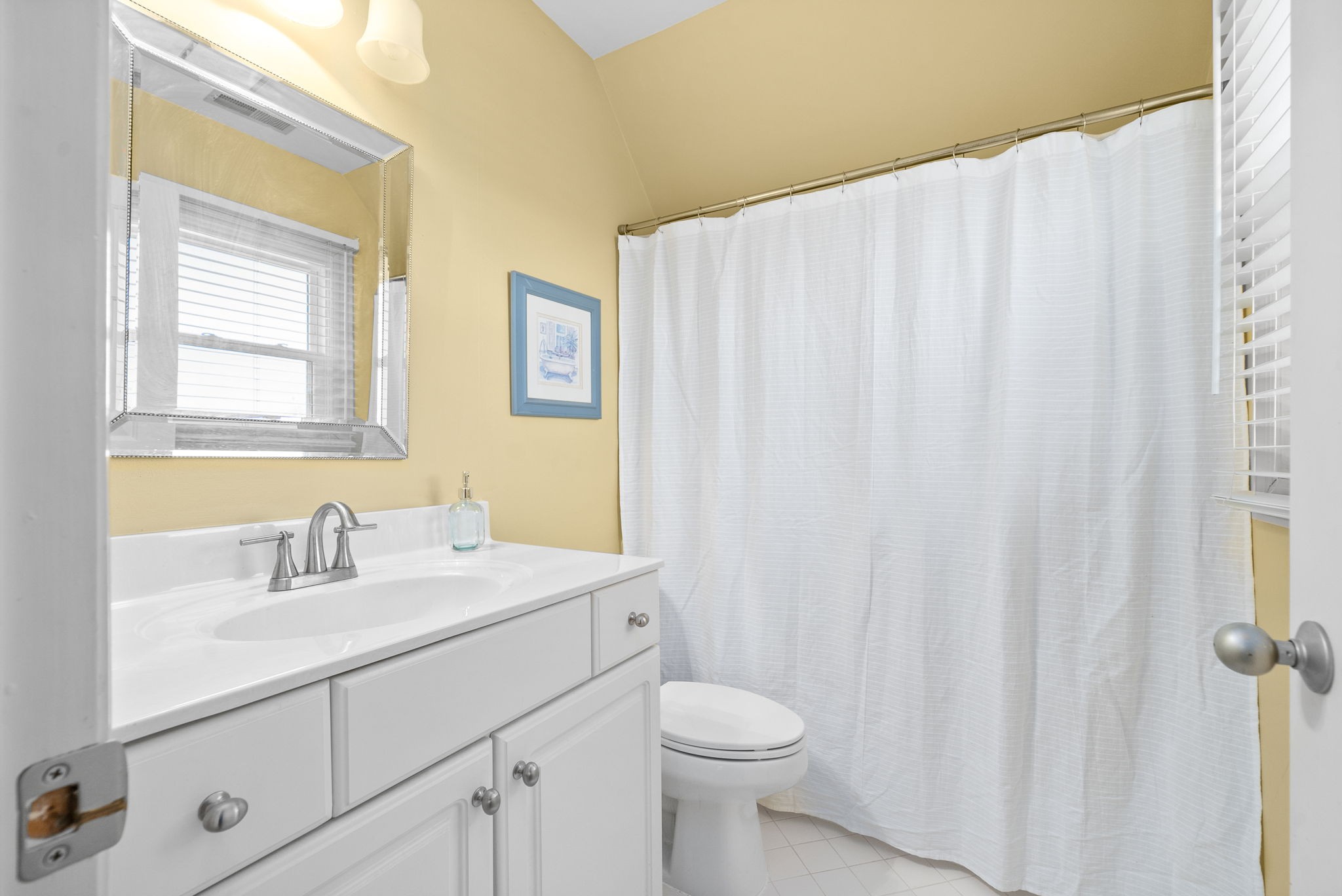 1904 Springcroft Drive Franklin, TN 37067 - Photo 19 of 30 a bathroom with a sink a toilet and a mirror