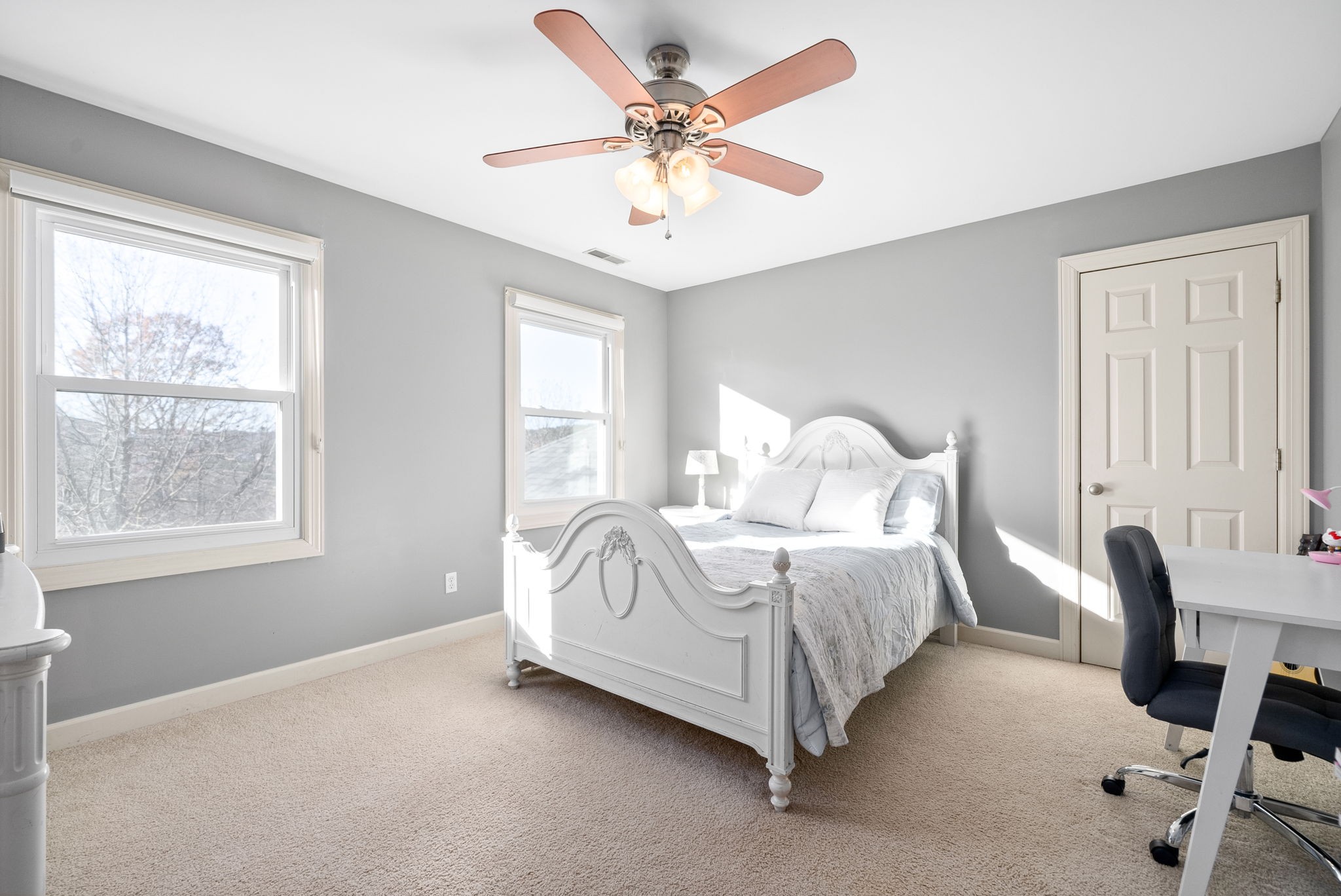 1904 Springcroft Drive Franklin, TN 37067 - Photo 20 of 30 a spacious bedroom with a bed and a chandelier