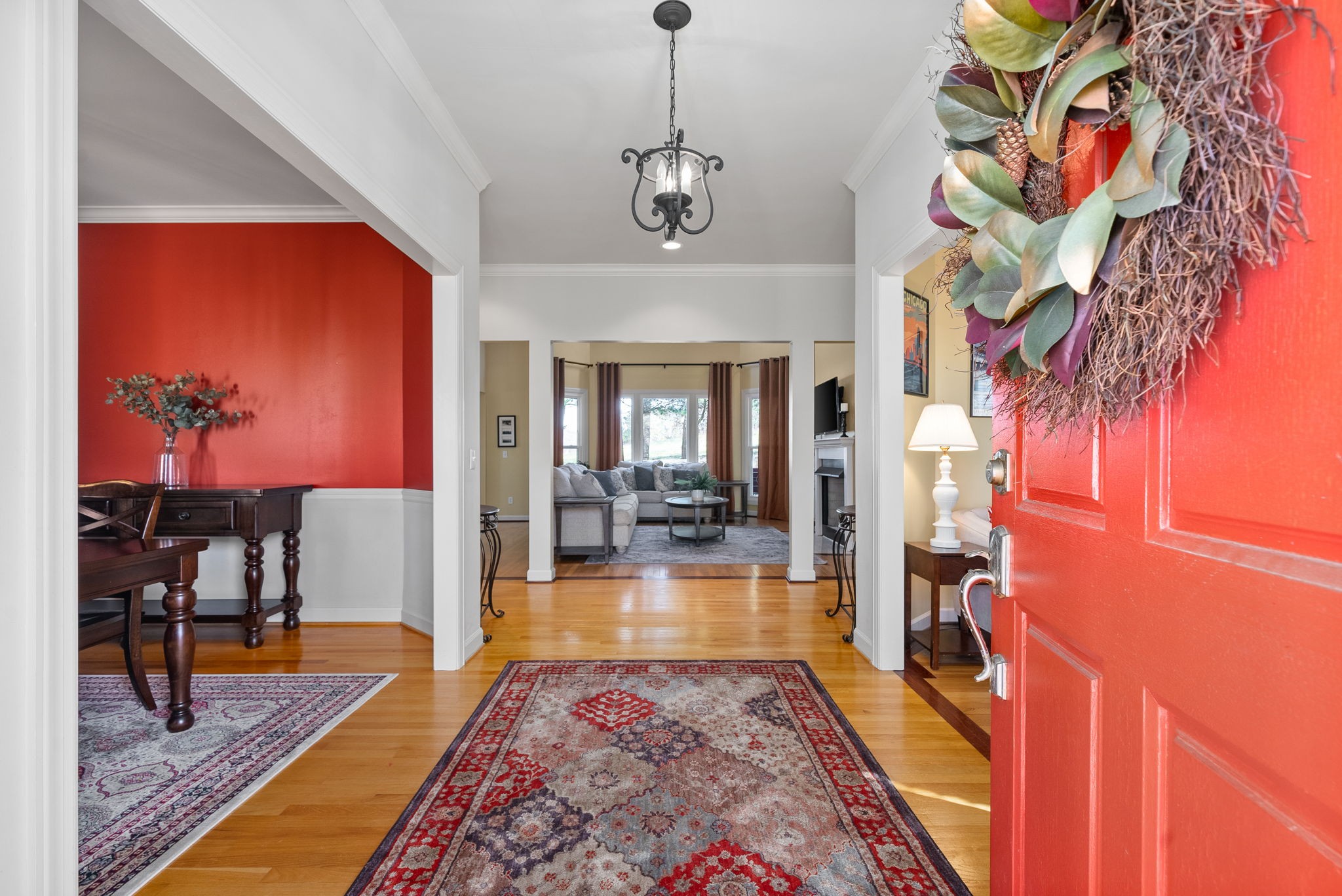 1904 Springcroft Drive Franklin, TN 37067 - Photo 3 of 30 a hallway with a flower pot and a rug