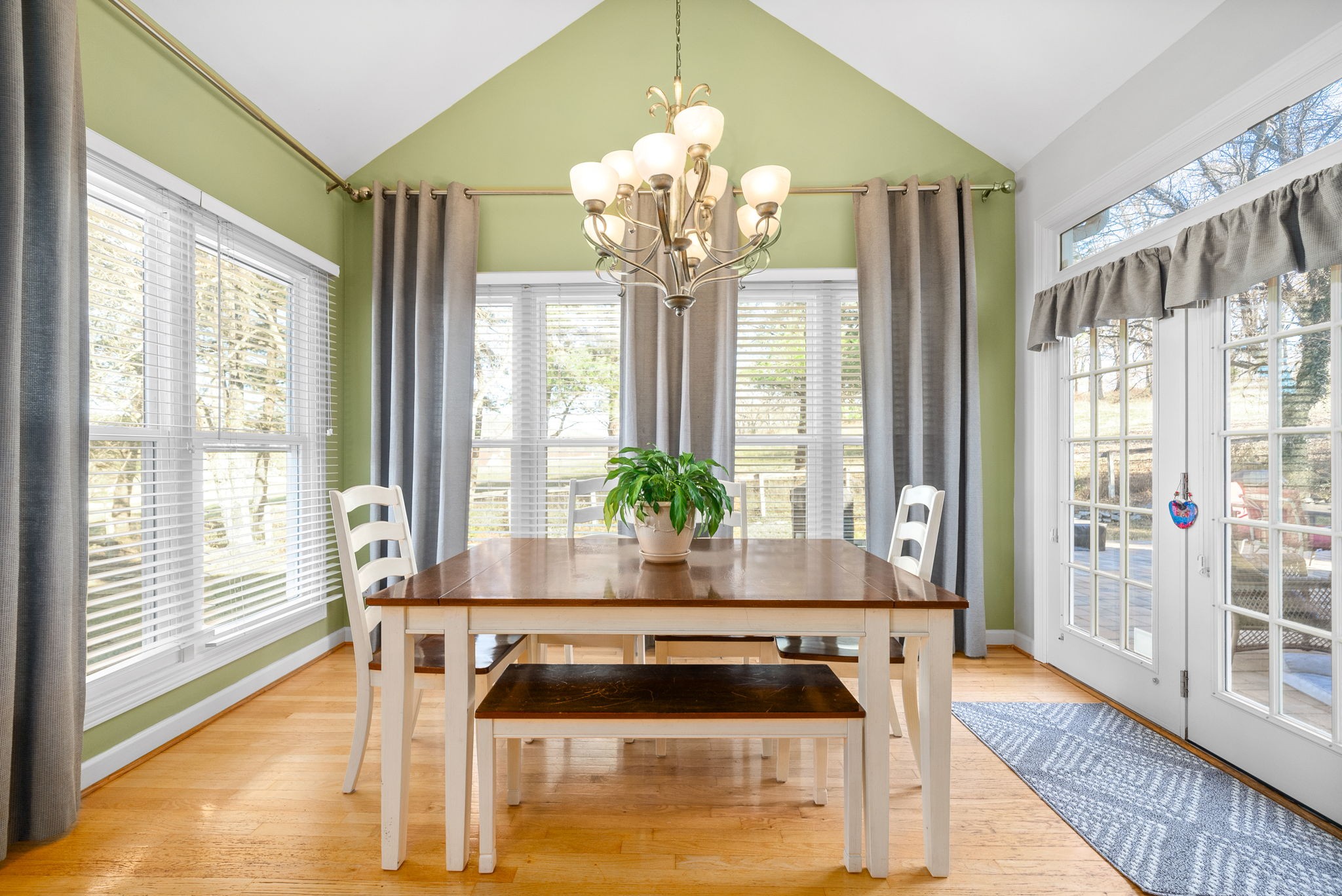 1904 Springcroft Drive Franklin, TN 37067 - Photo 8 of 30 a living room with furniture and a chandelier
