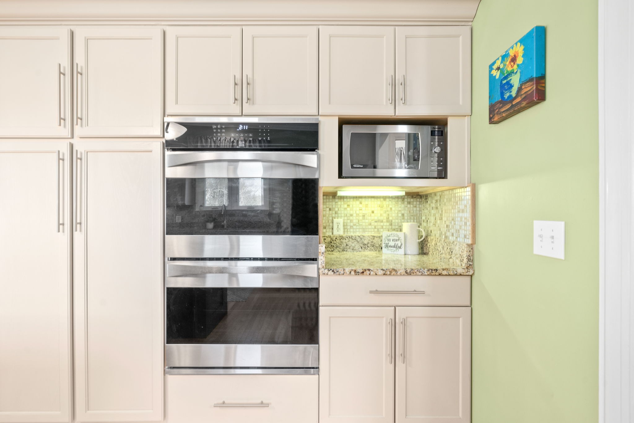 1904 Springcroft Drive Franklin, TN 37067 - Photo 10 of 30 a kitchen with stainless steel appliances cabinets and a refrigerator
