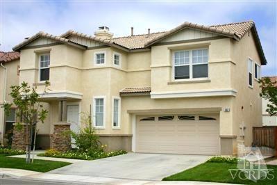 802 Pivot Point Way Oxnard, CA 93035 - Photo 1 of 13 a front view of a house with plants