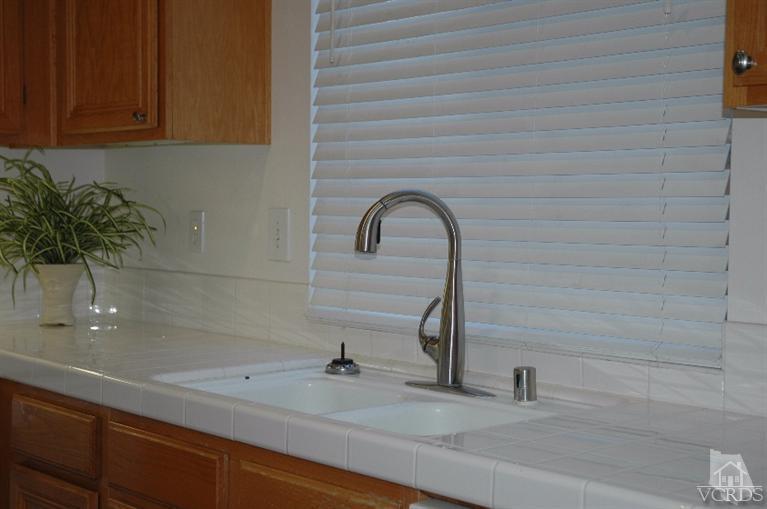 802 Pivot Point Way Oxnard, CA 93035 - Photo 6 of 13 a close view of a sink and a faucet in the kitchen