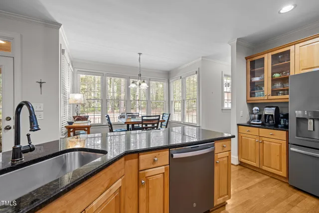 a kitchen with granite countertop a sink and counter space