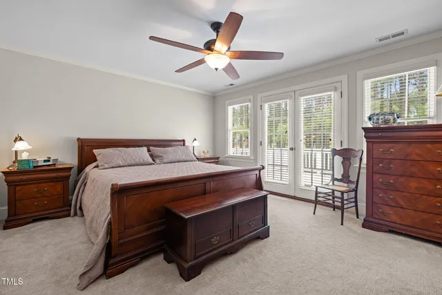 a bed room with a bed and a dresser