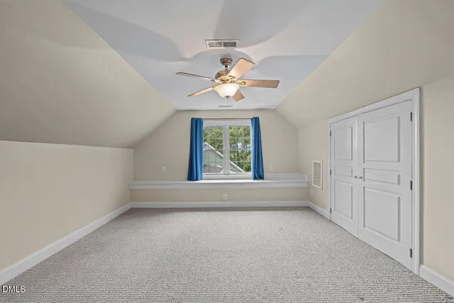 a view of a house with sitting area and furniture
