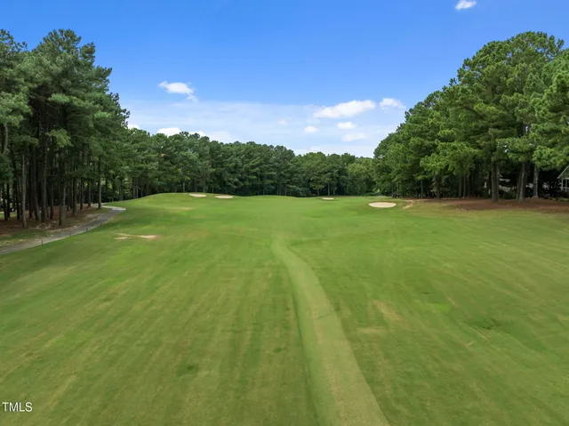 a view of a lake with a house