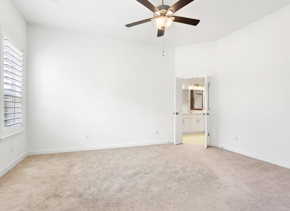 121 San Domenico Cove Georgetown, TX 78628 - Photo 16 of 24 an empty room with a window and a fan