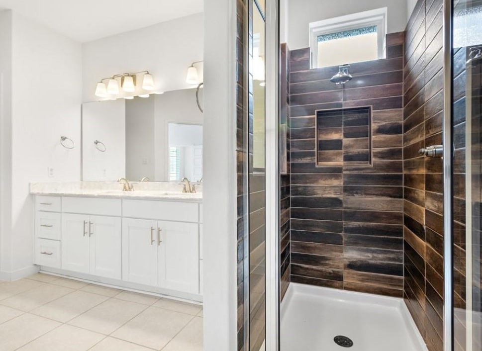 121 San Domenico Cove Georgetown, TX 78628 - Photo 18 of 24 a bathroom with a sink and a mirror