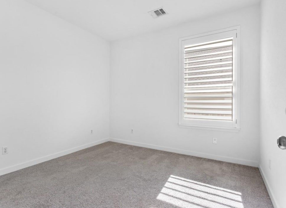 121 San Domenico Cove Georgetown, TX 78628 - Photo 22 of 24 an empty room with a window