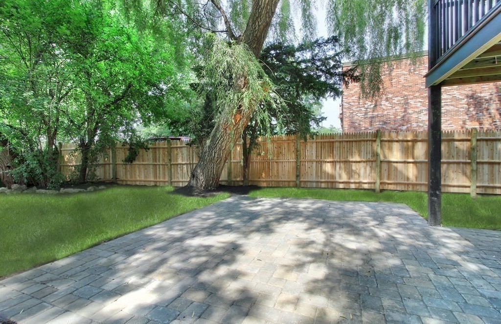 757 Washington Street, Unit 1 Boston, MA 02124 - Photo 16 of 17 a view of backyard with green space