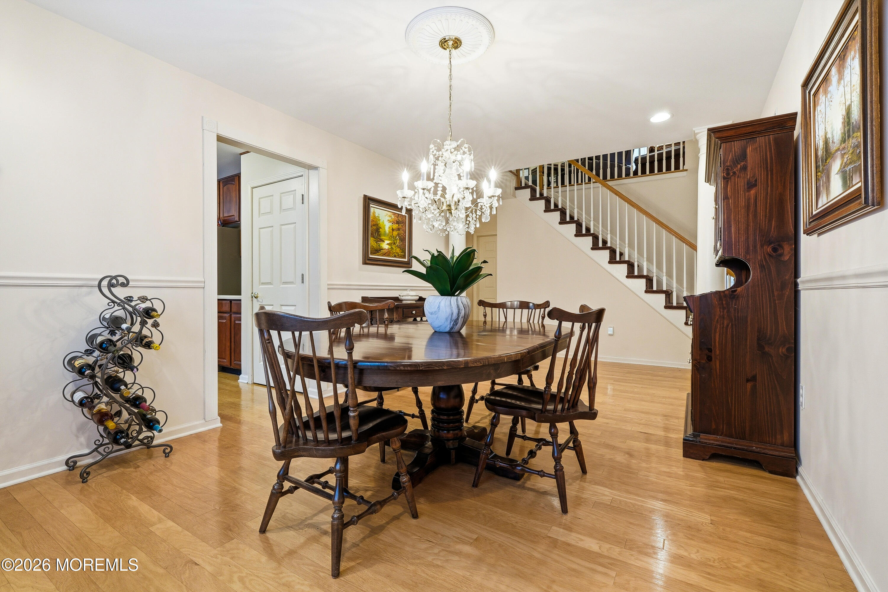 8 Casco Court Lakewood, NJ 08701 - Photo 13 of 56 a view of a dining room with furniture and wooden floor