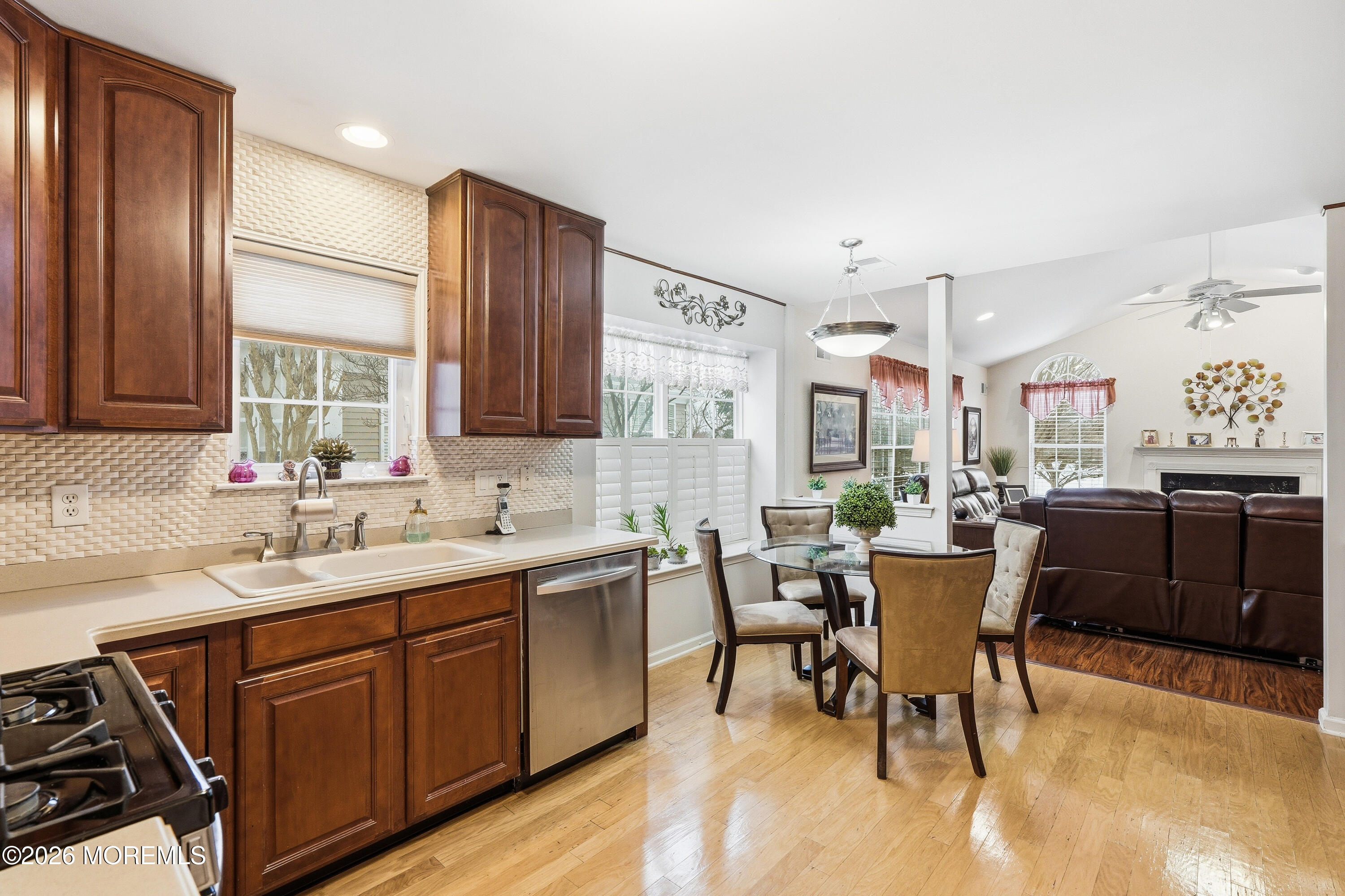 8 Casco Court Lakewood, NJ 08701 - Photo 14 of 56 a kitchen with a sink a counter top space and stainless steel appliances