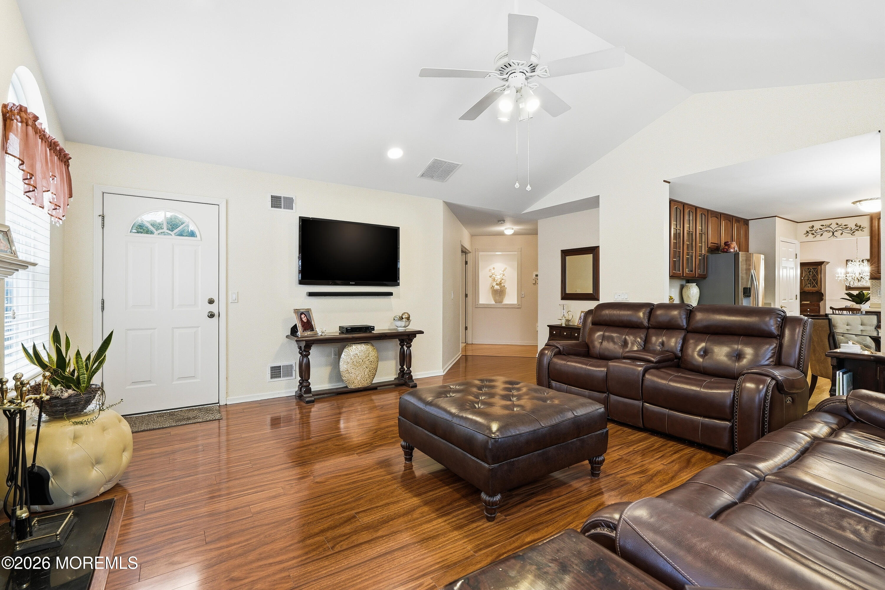 8 Casco Court Lakewood, NJ 08701 - Photo 20 of 56 a living room with furniture and a flat screen tv