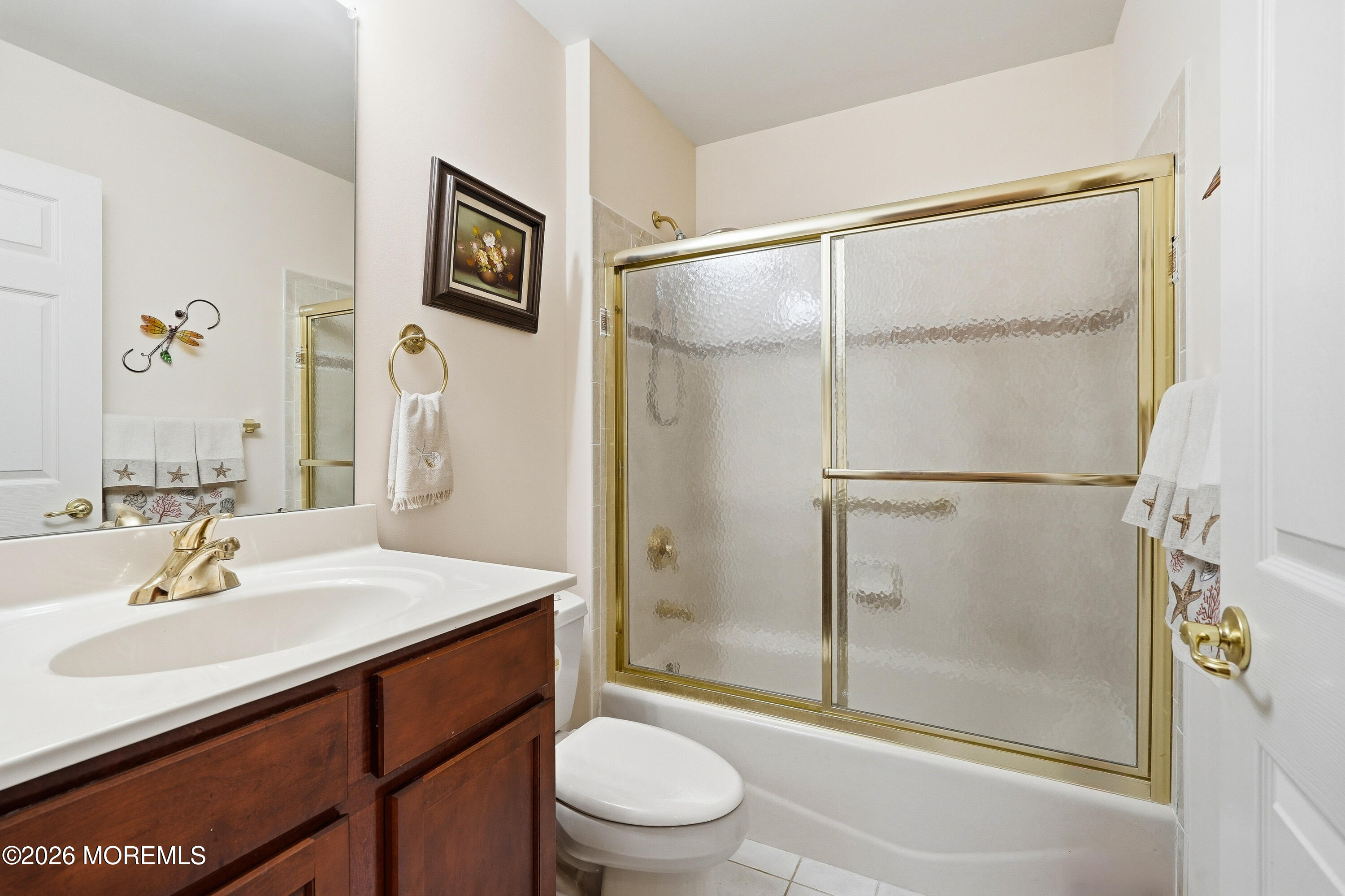 8 Casco Court Lakewood, NJ 08701 - Photo 22 of 56 a bathroom with a sink toilet and shower