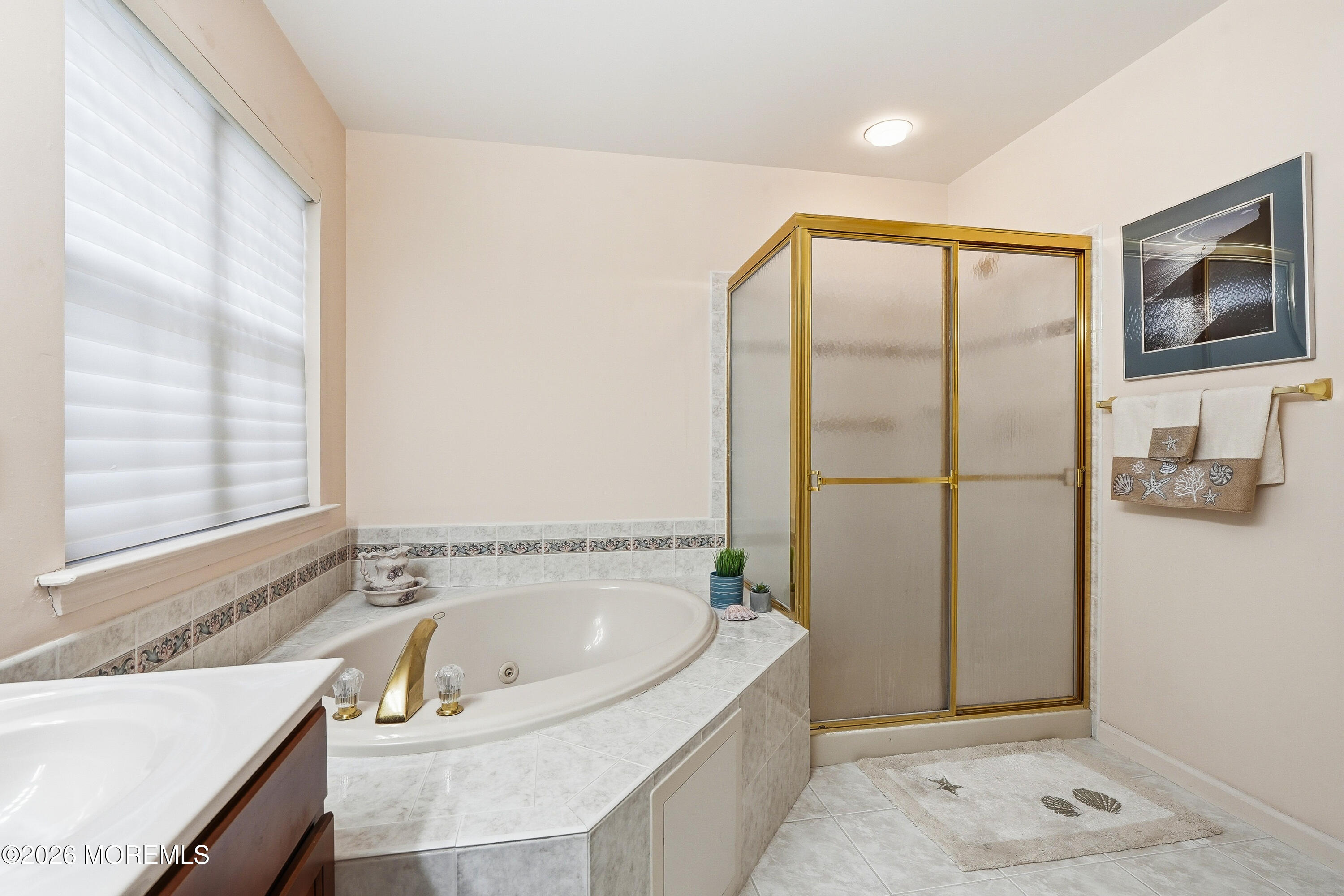 8 Casco Court Lakewood, NJ 08701 - Photo 28 of 56 a bathroom with a bathtub and a shower