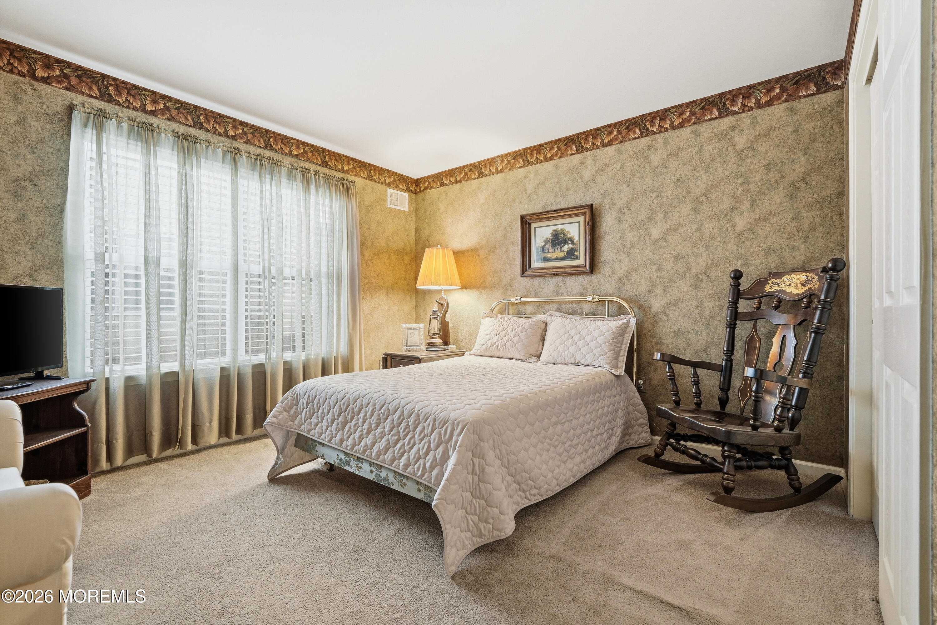 8 Casco Court Lakewood, NJ 08701 - Photo 30 of 56 a bed room with a bed and a chair