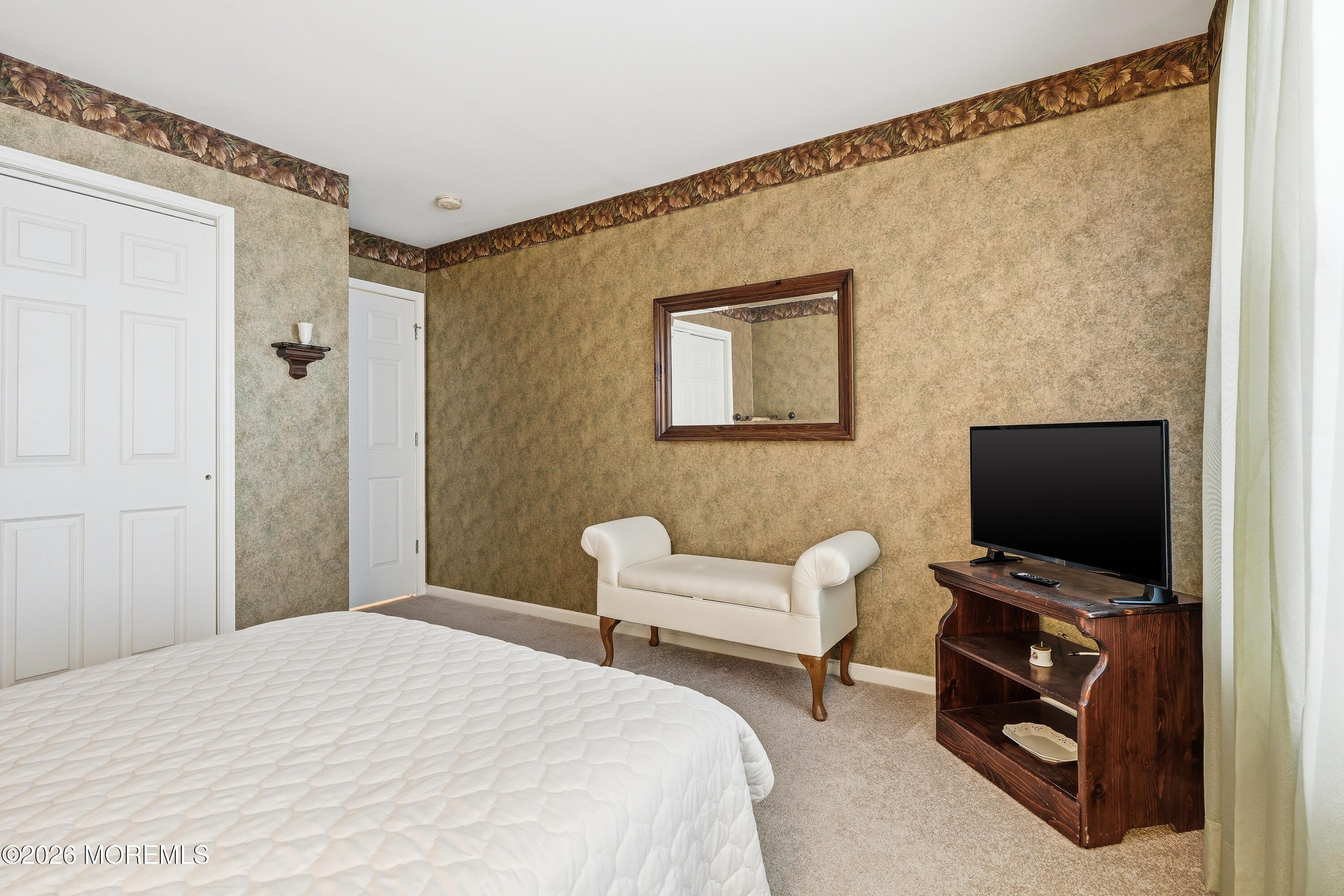 8 Casco Court Lakewood, NJ 08701 - Photo 31 of 56 a bedroom with a bed and a flat screen tv