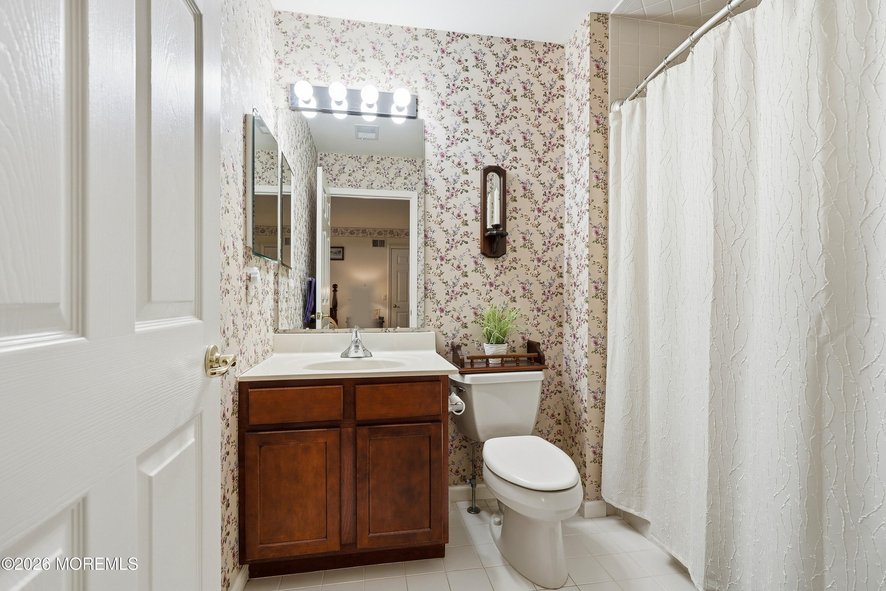 8 Casco Court Lakewood, NJ 08701 - Photo 38 of 56 a bathroom with a granite countertop toilet sink and mirror