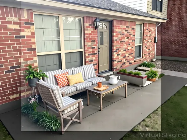 a outdoor living space with furniture and a potted plant