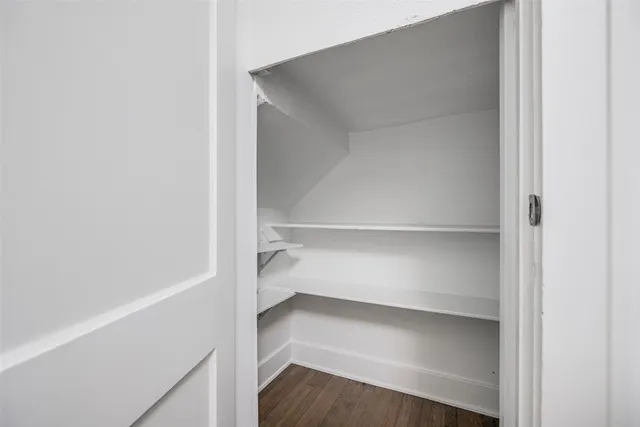 a kitchen with cabinets and appliances