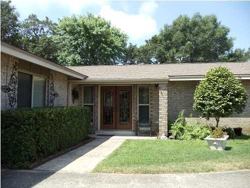 199 Country Club Road Shalimar, FL 32579 - Photo 2 of 21 front view of a house with a yard
