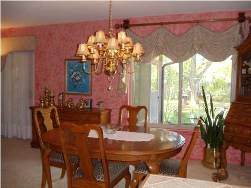199 Country Club Road Shalimar, FL 32579 - Photo 10 of 21 a view of a dining room with furniture window and outside view