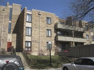 1926 Prairie Square, Unit 206 Schaumburg, IL 60173 - Photo 1 of 1 a front view of a building with parking space