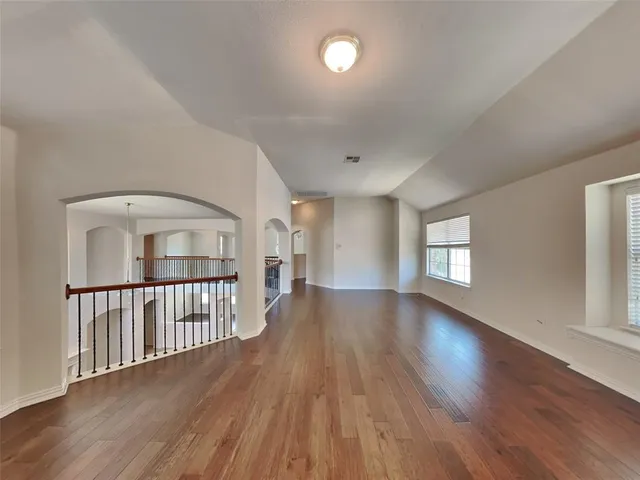 a view of livingroom with hardwood and furniture