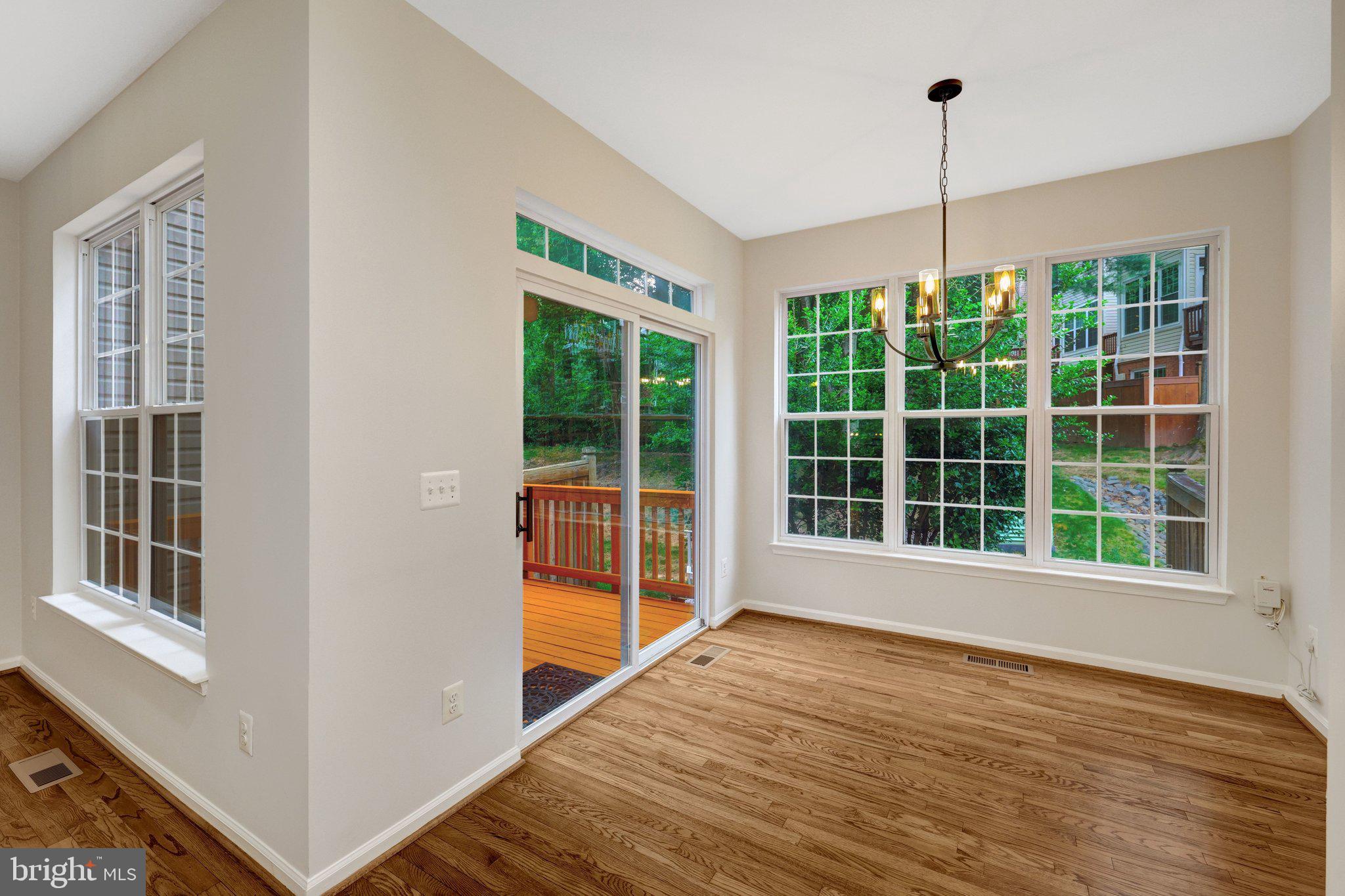 1268 Wild Hawthorn Way Reston, VA 20194 - Photo 24 of 55 Bright Breakfast Room w/ access to the rear deck