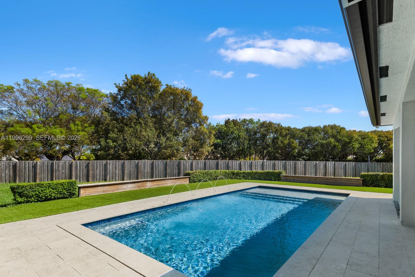 19781 Southwest 84th Court Cutler Bay, FL 33189 - Photo 41 of 53 a view of swimming pool with a yard and large trees