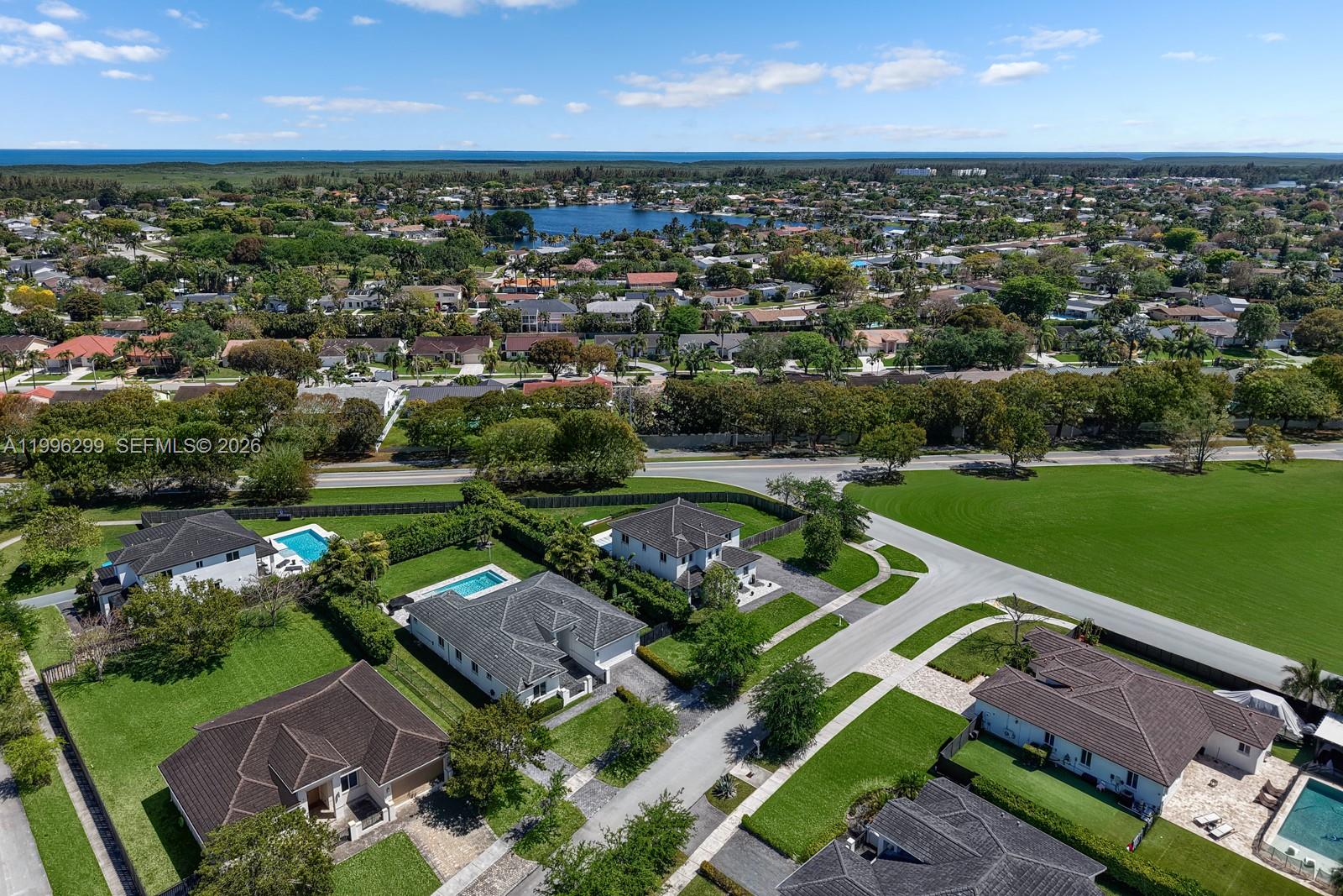 19781 Southwest 84th Court Cutler Bay, FL 33189 - Photo 49 of 53 an aerial view of a houses with a lake view