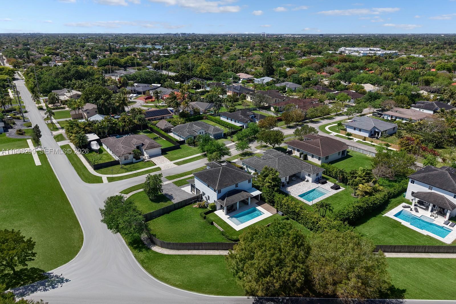 19781 Southwest 84th Court Cutler Bay, FL 33189 - Photo 51 of 53 an aerial view of a house with a garden