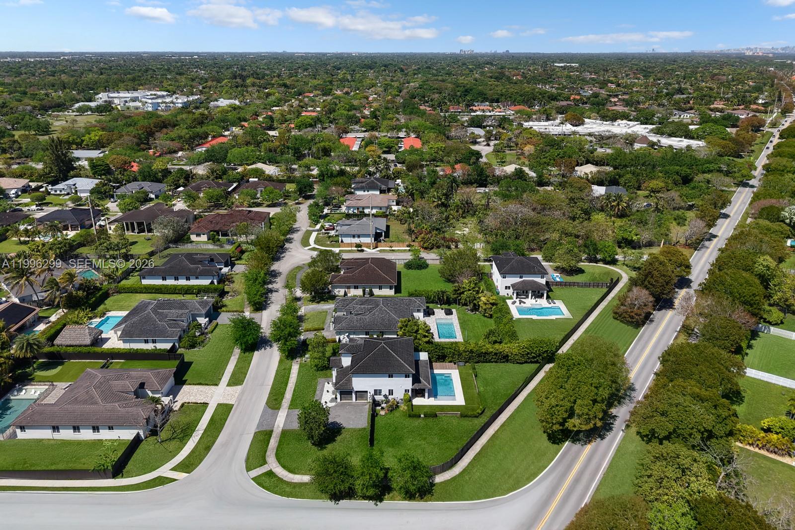 19781 Southwest 84th Court Cutler Bay, FL 33189 - Photo 52 of 53 an aerial view of residential houses with outdoor space