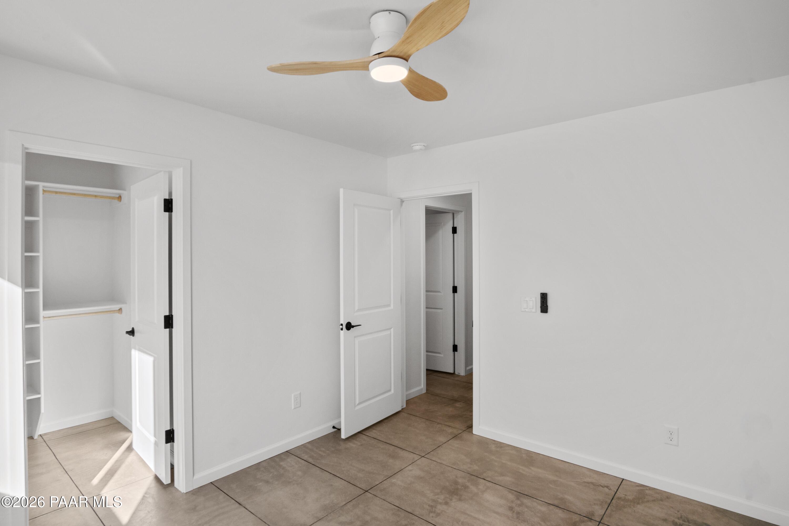 4920 East Amber Road Prescott, AZ 86301 - Photo 28 of 38 a view of a chandelier fan and entryway