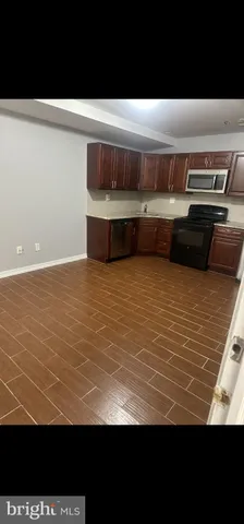 a view of kitchen with stainless steel appliances
