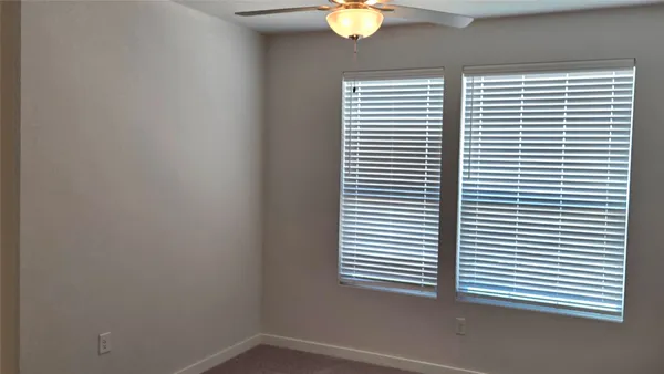 a view of a room that has a window in it