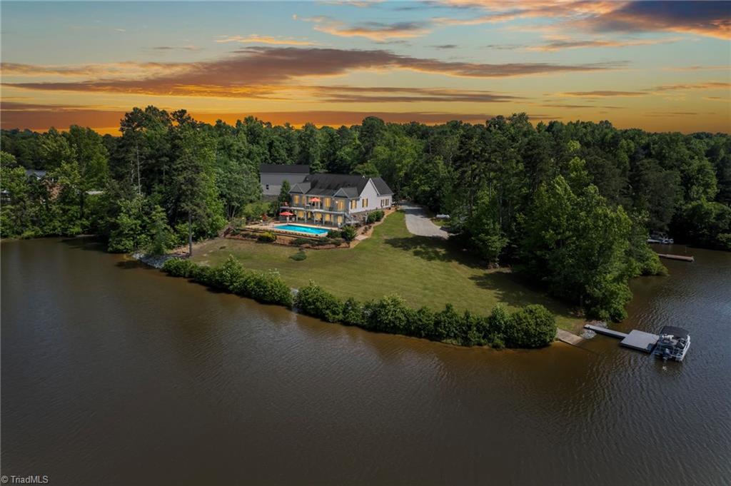 133 Lake View Road Prospect Hill, NC 27314 - Photo 1 of 50 Lake Roxboro in Caswell County view of this private lake 3 bedroom and 3 baths basement, inground pool and RV/3car detached garage, lots of extras