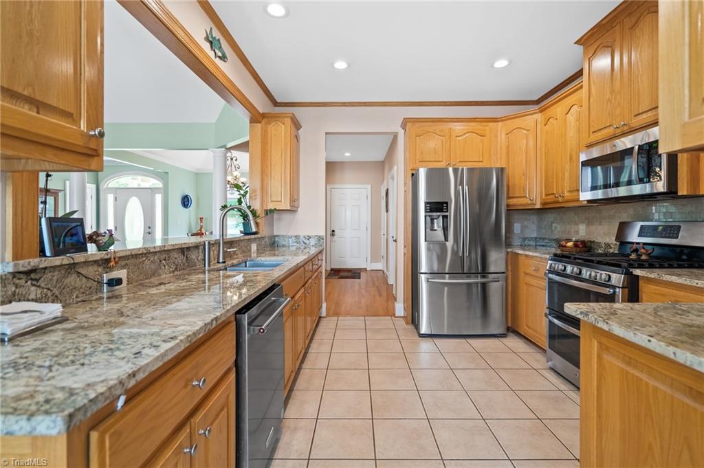 133 Lake View Road Prospect Hill, NC 27314 - Photo 13 of 50 Kitchen with Granite countertops and tile floors