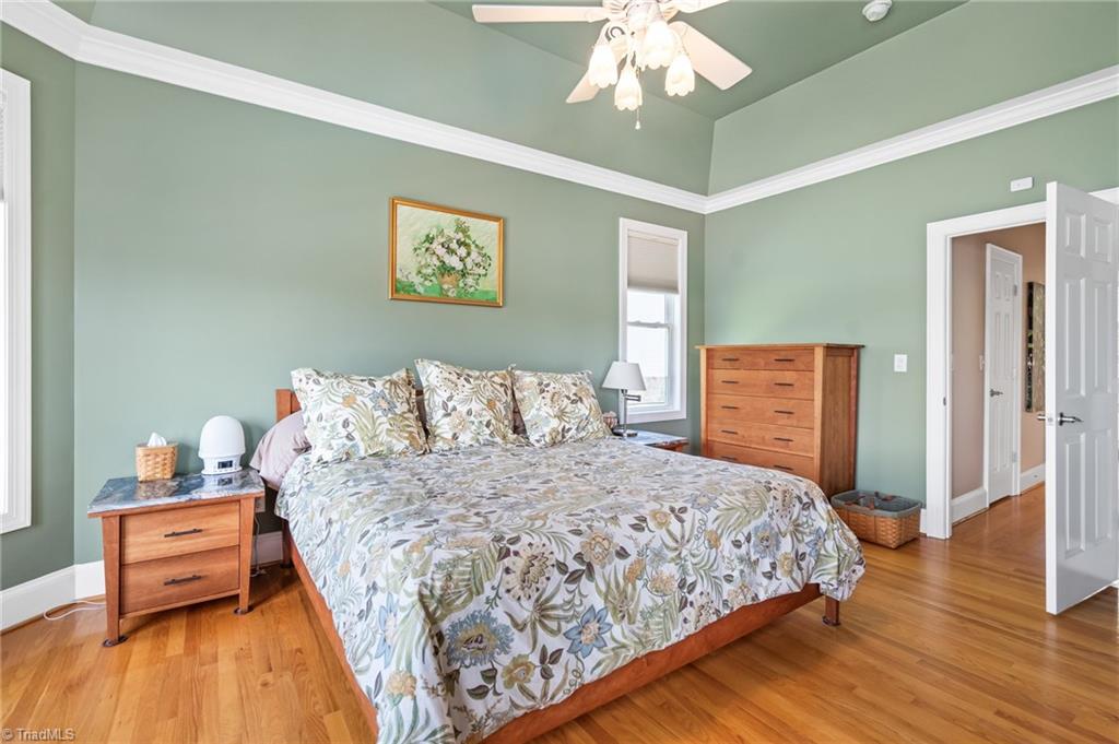 133 Lake View Road Prospect Hill, NC 27314 - Photo 23 of 50 View of Primary Bedroom and hall to closets and bathroom